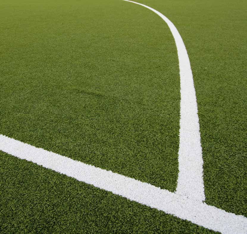 White halfway line on a Condor Grass artificial sports pitch, close-up