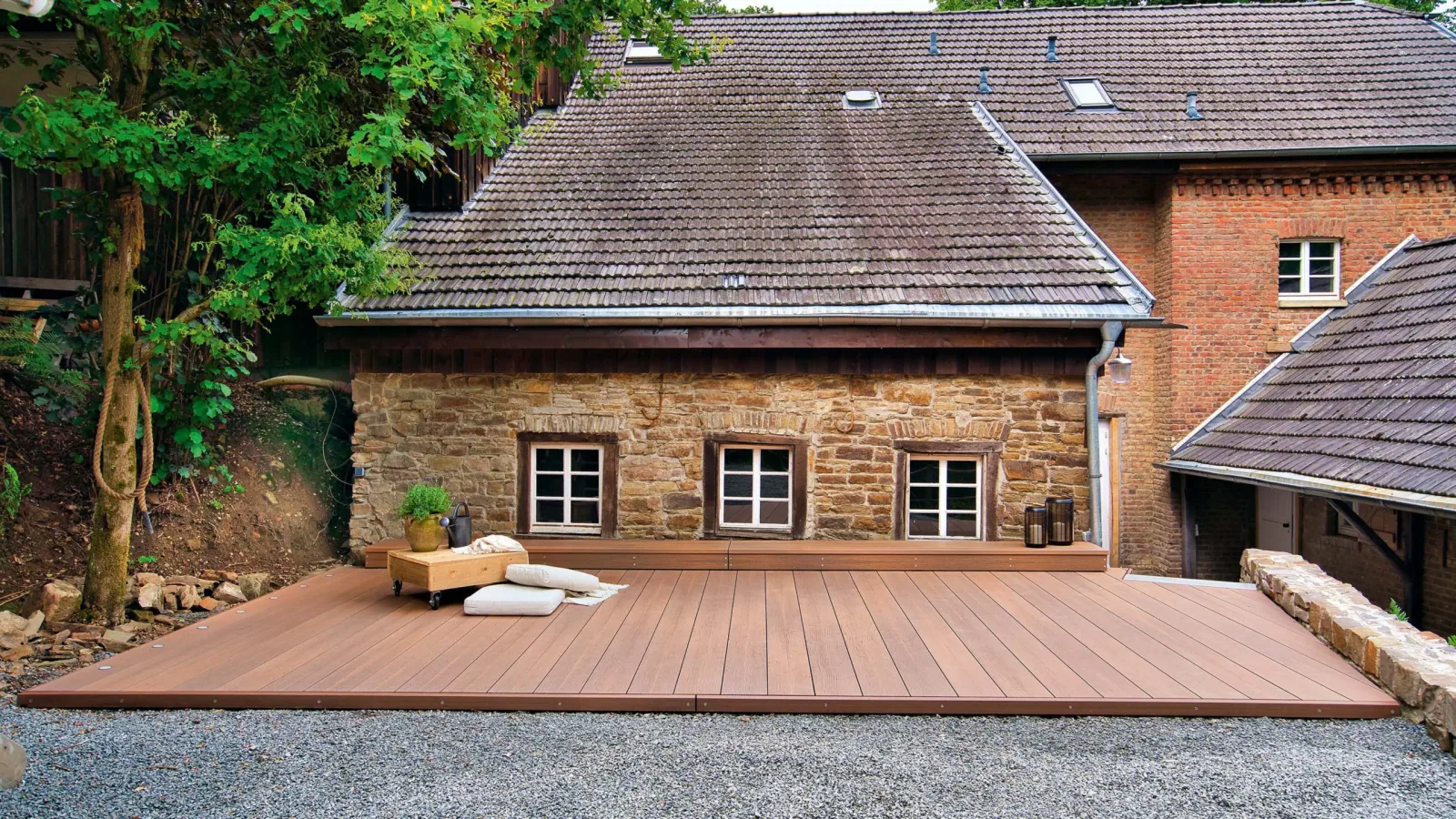 megawood SIGNUM decking on a family home's terrace (manufacturer photo)